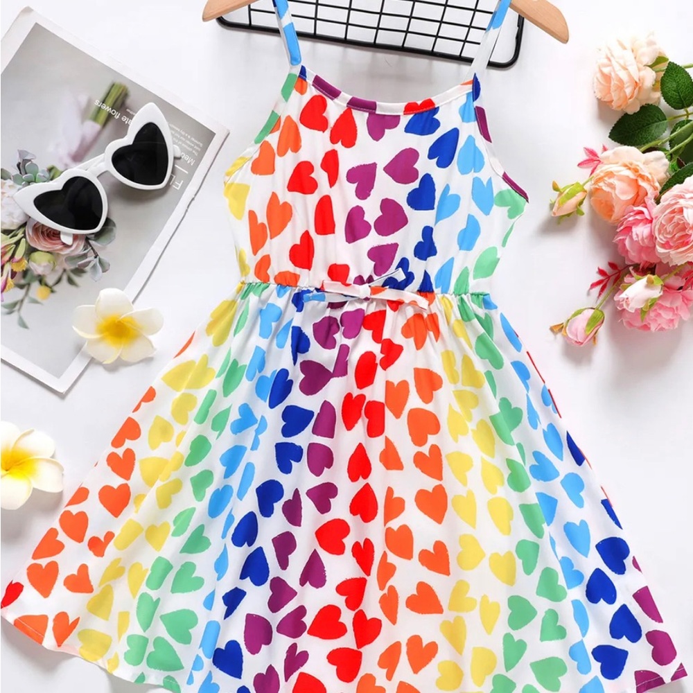 Adorable colorful hearts dress in rainbow colors!
New with tags PatPat- 8-9